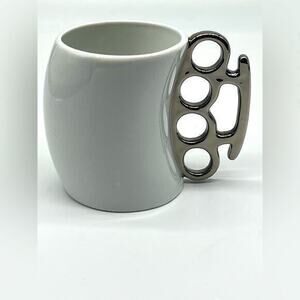 Brass knuckles coffee mug white and silver